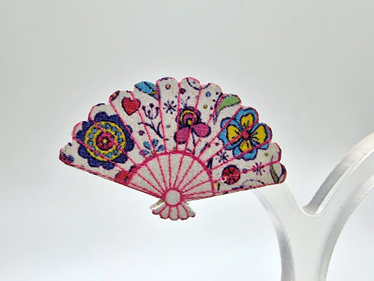 Decorative fan-shaped earring with colourful patterns on a white background